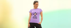 Vibrant purple t-shirt with a playful Little Picasso arts and crafts logo, perfect for creative or casual wear highlighting custom apparel options.
