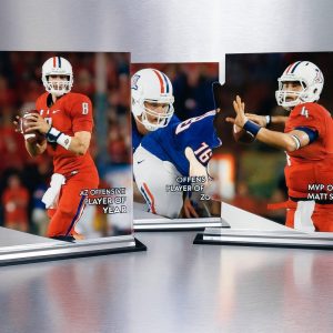 Vivid acrylic sports awards featuring football players in action, customized with bold text highlighting achievements like "AZ OFFENSIVE PLAYER OF THE YEAR". Perfect for sporting event recognition or team celebrations.