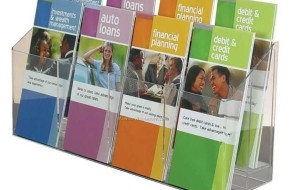 Bright, professional brochure stand showcasing various financial service signs including auto loans, investment management, and credit options.