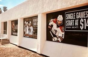 Colorful sports-themed signs and banners promoting events, designed with high-quality graphics for visibility and impact to attract viewers and customers.